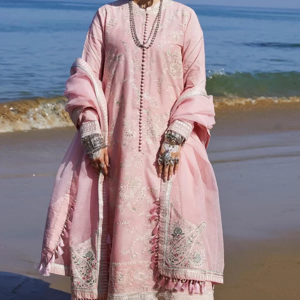 Product Details Dyed Karandi Net Dupatta 2.65 Yards Embroidered Lawn Dupatta Border 8.6 Yards Embroidered Lawn Dupatta Patches 4 Pcs Embroidered Lawn Front 1 Yard Dyed Lawn Back & Sleeves 1.6 Yards Embroidered Organza Shirt Border 1.6 Yards Embroidered Organza Sleeves Border 1 Yard Embroidered Organza Neckline 1 Pc Embroidered Organza Trouser Border 1.15 Yards Paste Printed Cambric Trouser 2.15 Yards Delivery Next Day Delivery Collections typically arrive within 2-4 working days across the UK. Care Instructions Dry clean recommended for long-lasting fabric quality. Iron at a moderate temperature to maintain fabric integrity. Avoid bleach or harsh stain removers to preserve colors and embroidery. Unstitched items include fabric only (not ready-to-wear). Minor variations in color and embellishments may occur after restocking. Custom length or alterations beyond our standard size chart fall under customized stitching. Pret/Ready-to-wear articles cannot be customized. Sleeveless dresses are stitched with sleeves by default unless a sleeveless option is specifically requested. (Straight sleeves are attached.) Note: Accessories featured are exclusive to the stitched option and actual color may slightly vary. Shop now Pakistani Designer Bridal & Party Wear Suit available in the UK and worldwide, exclusively from ZeeCollectionsLtd. zara shahjahan, 3 piece suit, unstitched, jacquard, amira 5a, front